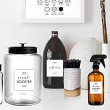 Laundry Jars and canisters in a laundry room with laundry sign