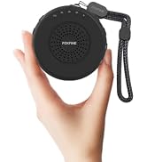 Hand holding up a compact FOXFINE portable sound machine, showing its portable design, wn03 black
