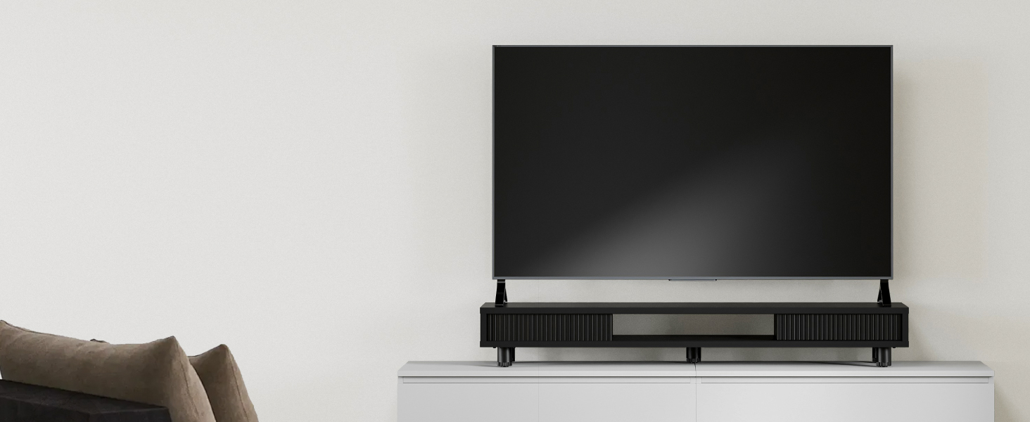 You can use it as a TV stand because the monitor stand riser is sturdy and stable enough