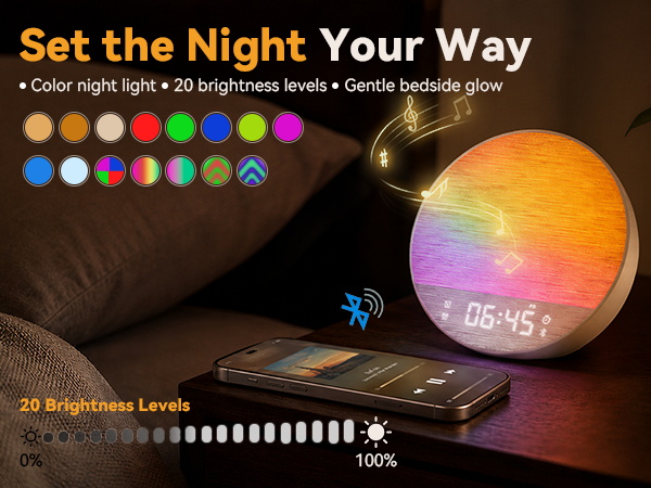Color changing night light and Bluetooth speaker playing music on a bedside table.