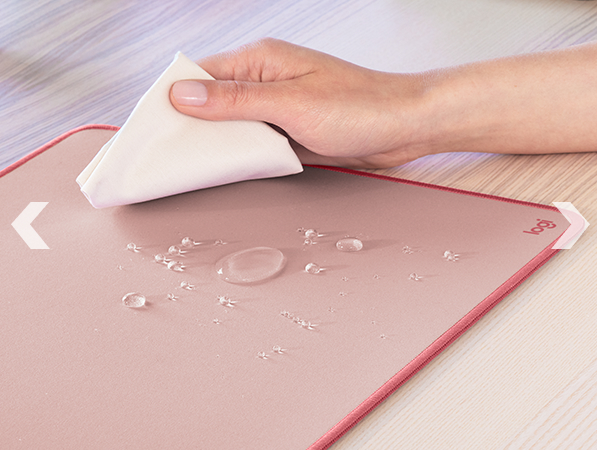 zoom of a woman cleaning studio series desk mat large dark rose mouse pad