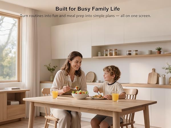 Family dining in kitchen with calendar showing chore, meal and schedule features