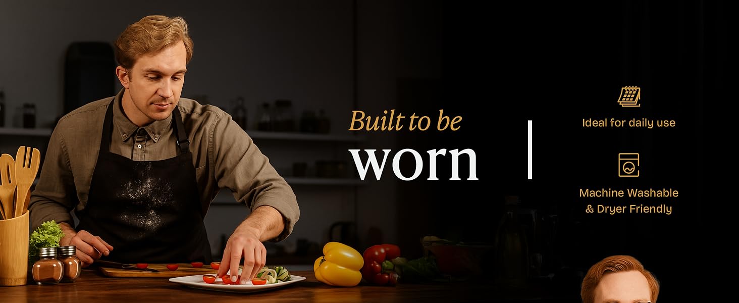 Elegant home chef wearing a black Will Well apron while plating a dish.