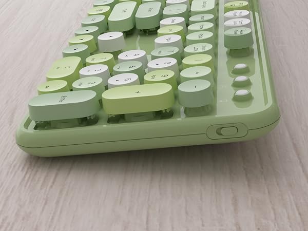green wireless keyboard and mouse