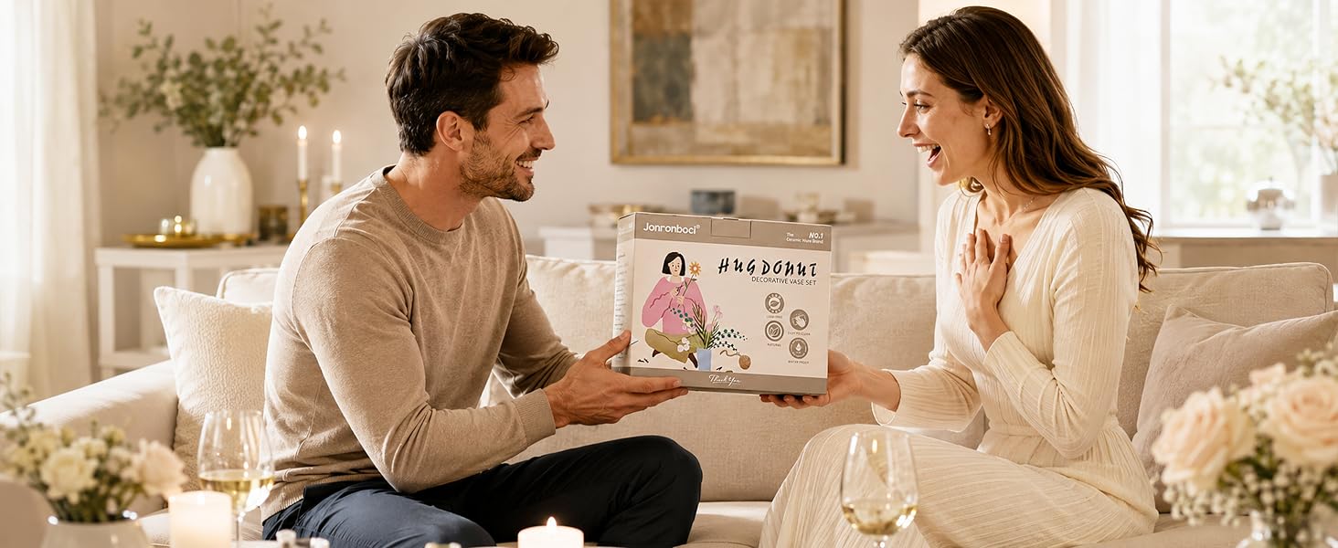 Man gives vase gift box to woman.