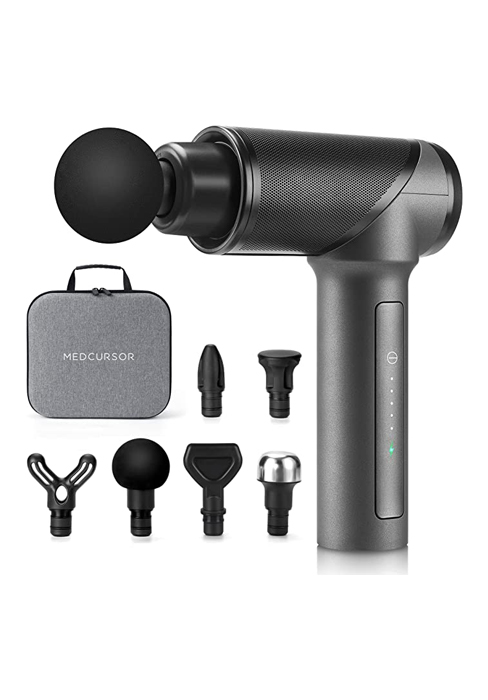 Handheld massage gun with multiple attachments and carrying case. Device features a black body with gray handle and includes various massage heads for different uses.