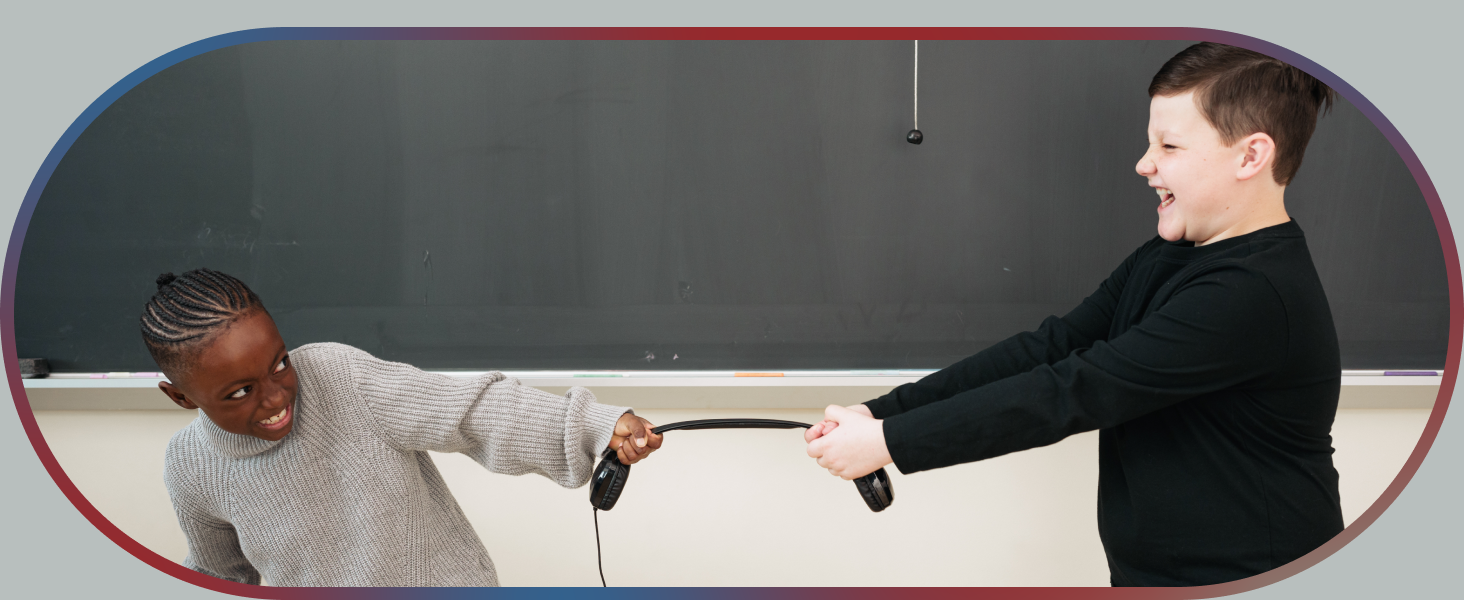 Two children attempting to pull apart a Cyber Acoustics headphones
