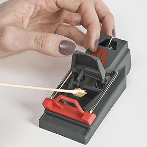 Victor Quick-Kill Mouse Trap features a built-in bait cup for easy baiting