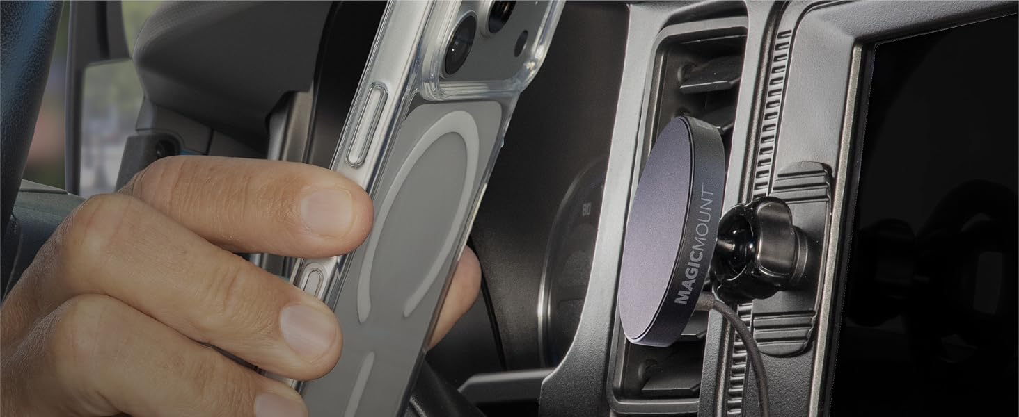 Dashboard cell phone holder with adhesive base MagSafe car mount charger sits near vehicle controls