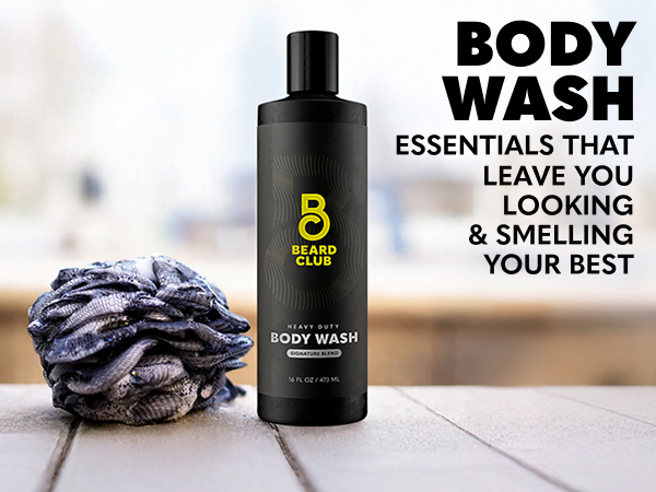 mens body wash 16oz heavy duty shower gel sitting next to sudsy loofah