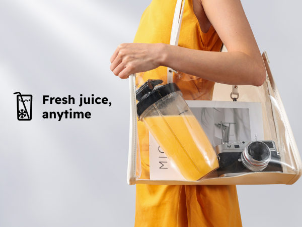 Woman carries a Sangcon travel cup filled with a fresh smoothie in her tote bag.