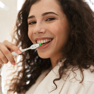 Woman Brushing teeth