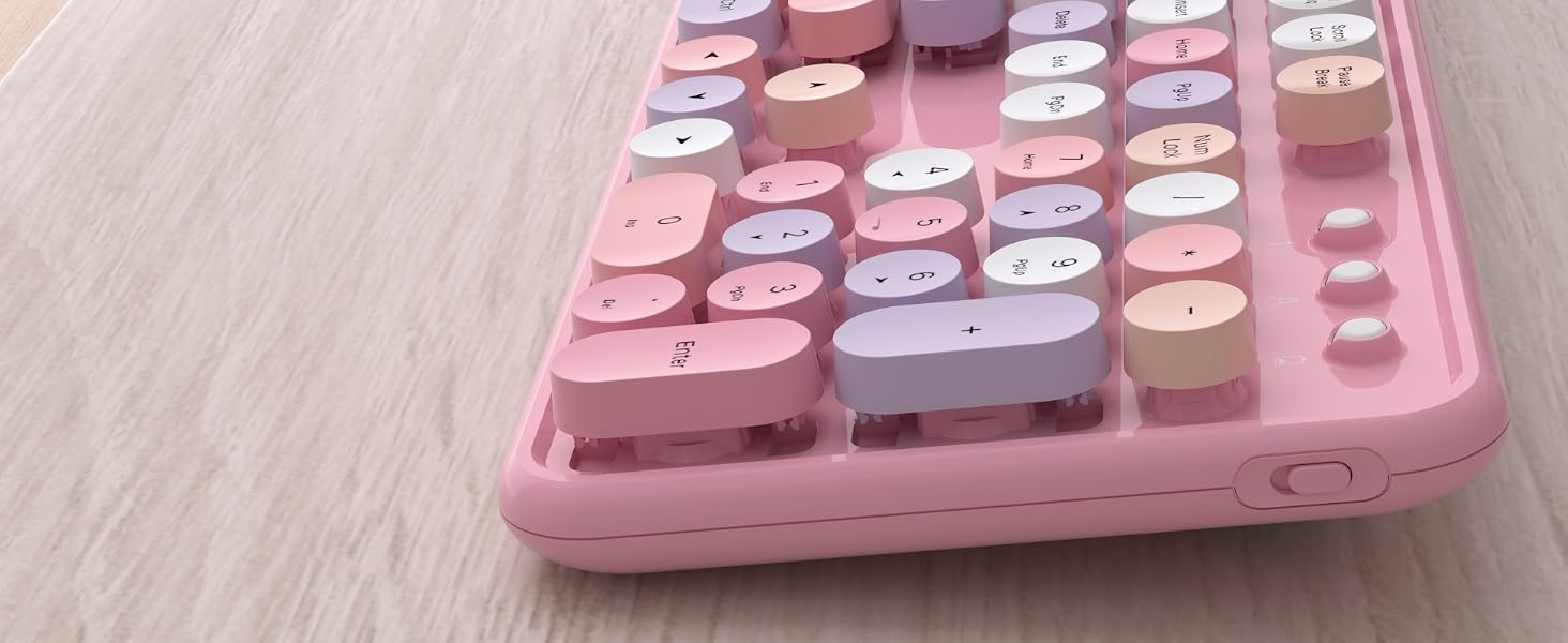 pink colorful wireless keyboard and mouse