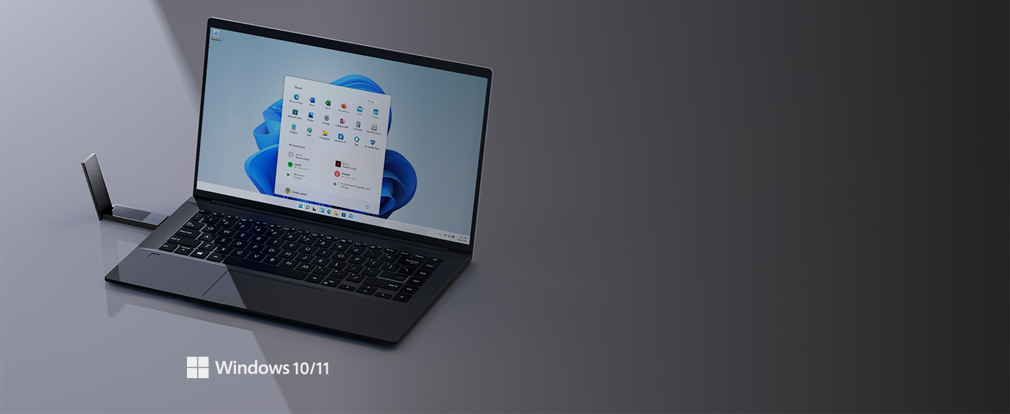 Laptop displaying Windows interface on dark screen, appears to be showing Windows 11 desktop.