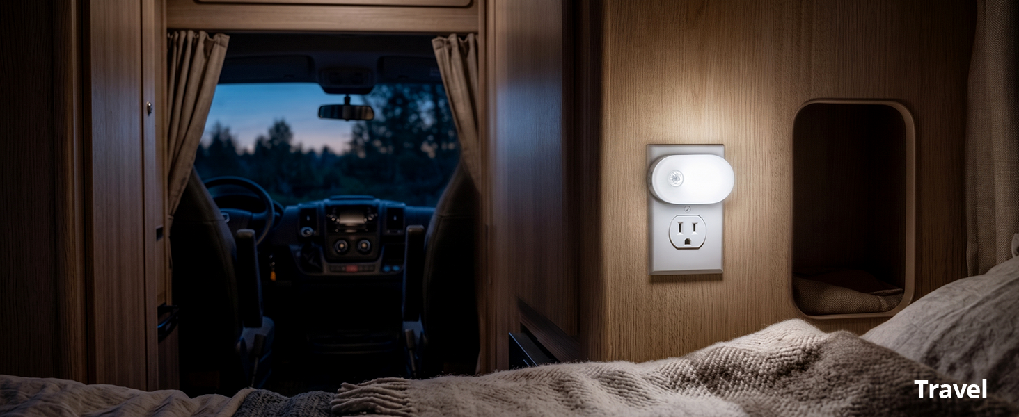 Compact plug-in night light illuminating an RV interior.