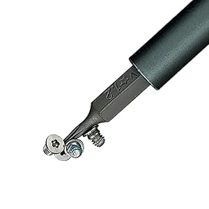 Magnetic screwdriver bit holding a small screw for electronics repair
