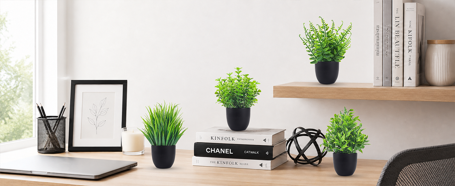 four artificial green plants black pots office shelf decor
