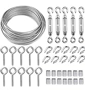 Cable railing kit components: coiled steel cable, turnbuckles, eye screws, thimbles, and ferrules. Stainless steel hardware for outdoor cable railings or wire fencing systems.