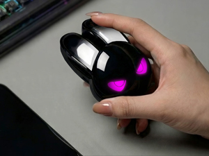 Lifestyle scene showing a pair of hands — one clearly left-handed grip and one right-handed grip sug