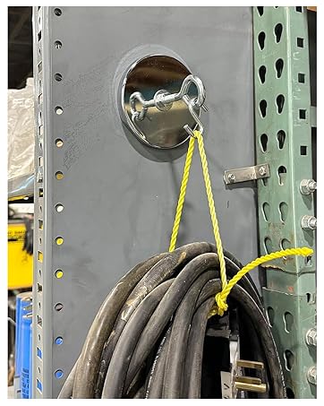 Image of heavy duty magnetic hook holding up large cable and rope.