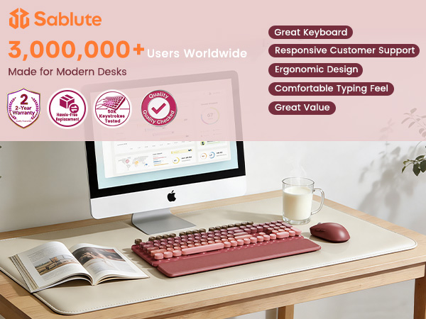 Pink wireless keyboard mouse combo with wrist rest on modern desk setup comfortable typing feel