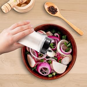Hand with Spice Jar
