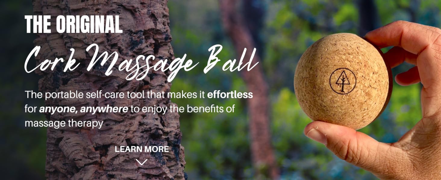 Hand holding a Rawlogy cork massage ball in a forest