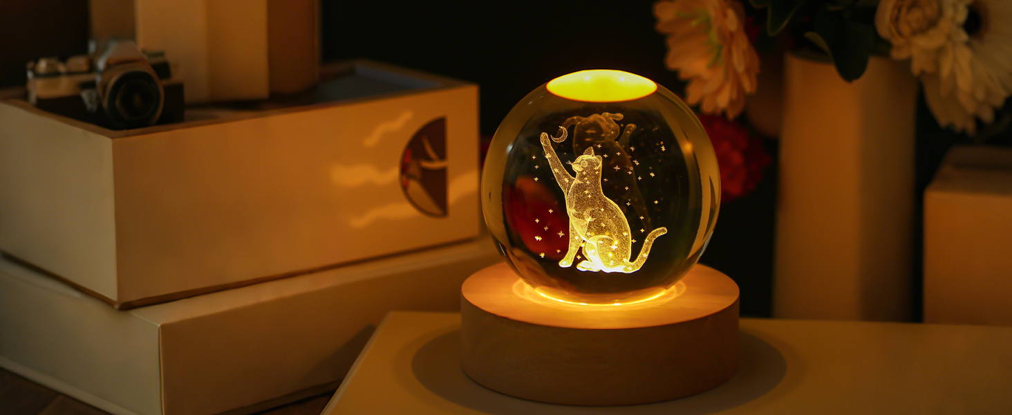 2.3IN CRYSTAL BALL FIGURINES