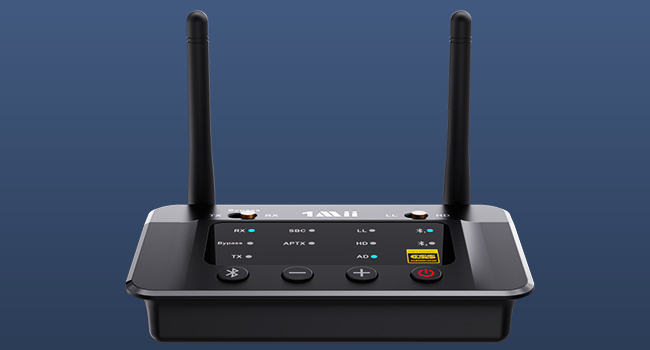 Black wireless router with two antennas . Device has a sleek, rectangular design with rounded edges.