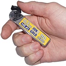 Hand holding lead dispenser