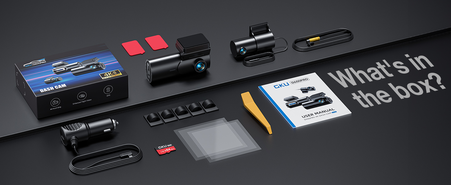 Product unboxing layout showing various black electronic components, mounting accessories, and instruction manual arranged on dark surface.