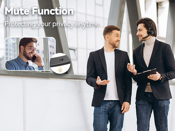 Desk phone with mute function feature, protecting privacy. Two men in business attire conversing in background, demonstrating workplace usage.