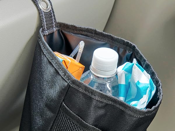 TrimTrash hanging from a glove box