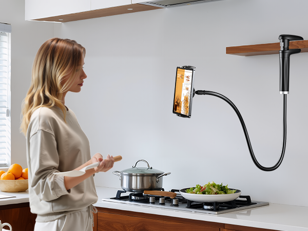 Looking at recipes in the kitchen