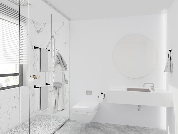 Modern bathroom with wall-mounted black hardware set