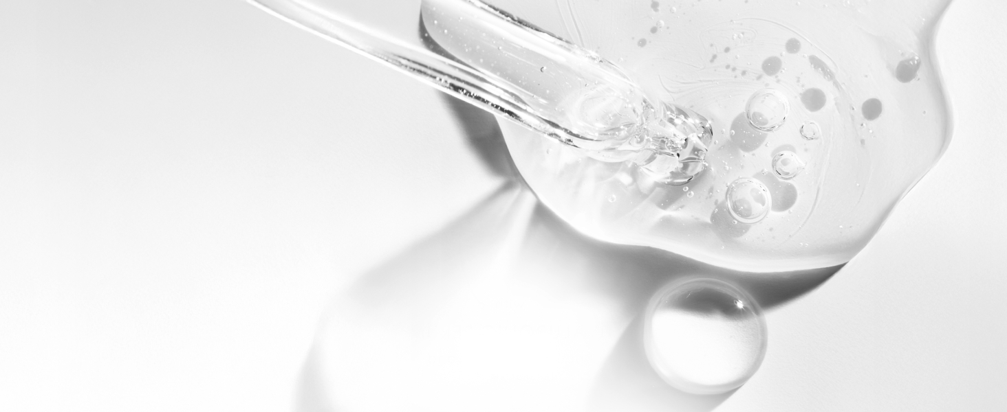 Liquid product & a dropper on a white background.