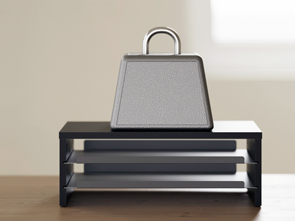 Made of MDF board and metal, this monitor riser holds up to 44 lb, stably supporting your computer.