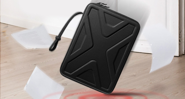 a large black floor mat with a red light on the floor.