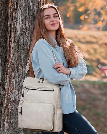 Beige structured handbag with multiple pockets and compartments. Features adjustable shoulder strap, front zip pocket, and side pockets for versatile carrying options.
