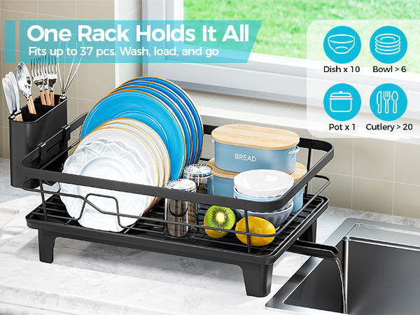 Text reads 'One Rack Holds It All' with 'Fits up to 57 pieces of cookware and more' and icons for 'Pots & Pans, Cutlery.' Black metal dish rack holding blue pot, white container, and yellow measuring tools on kitchen counter.