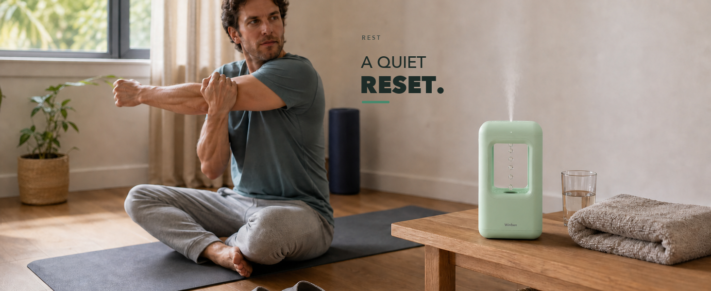 WINBEN green cool mist humidifier running during a daytime stretching and rest routine