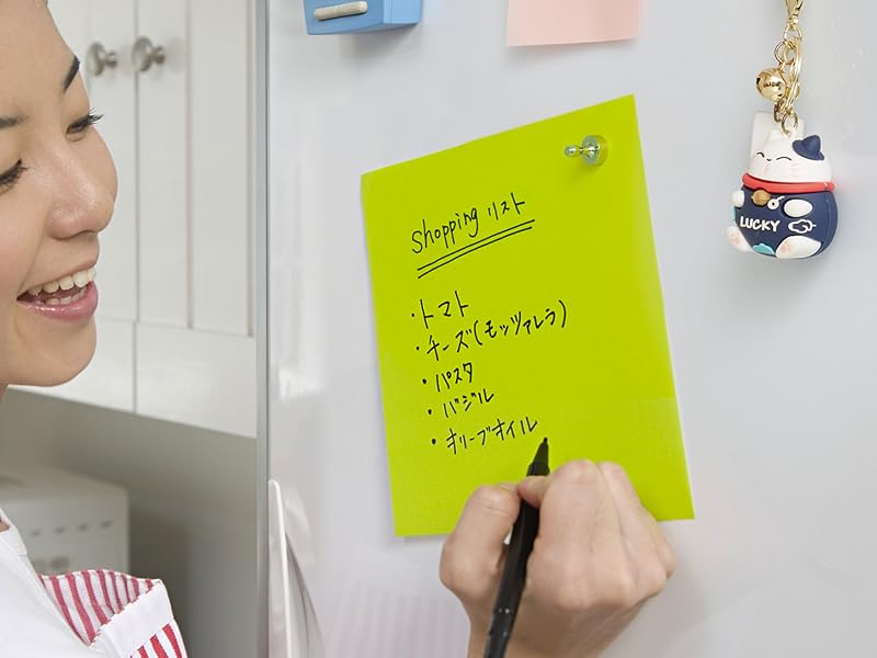BTLIN branded wall-mounted note-taking setup showing sticky notes and writing surface with blue mounting component.