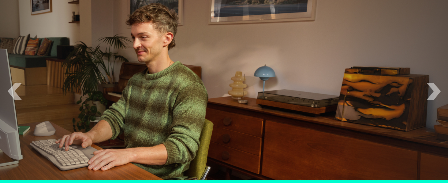 a person sitting on a computer