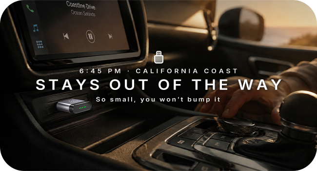 Bluetooth CarPlay adapter stays out of the way during music and navigation use.