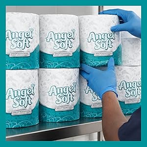 Rolls of Angel Soft toilet paper rolls displayed on a metal shelf with a patterned design
