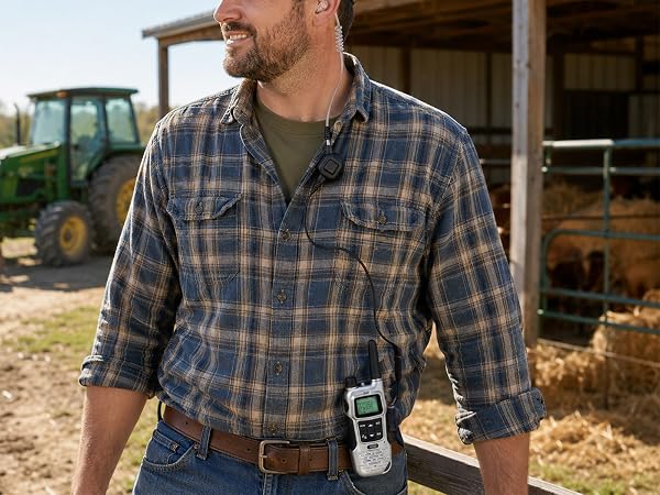 Farm worker using wired headset adapter with FRS-A1 clipped to belt