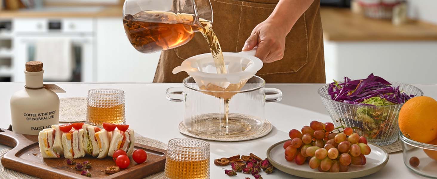 Brew and filter tea, and serve with sandwiches and fruit for afternoon tea