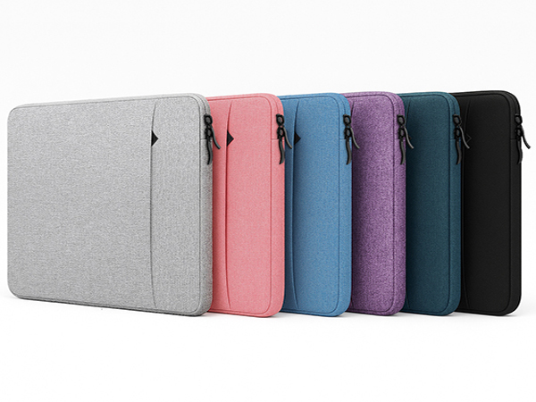 Collection of laptop sleeves or cases shown in multiple colors including gray, pink, blue, purple, and black, arranged in a row.