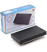Black electronic device in retail packaging with blue accents. Shows SATA hard drive adapter or enclosure unit.