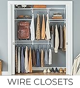 reach in closet with ventilated wire shelves for clothes, pants, jackets, sweaters
